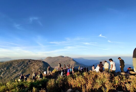 PEOPLES WAITING FOR SUN WITH FULL FOG LOCATED AT LAMBASINGI AND VANAJANGI.