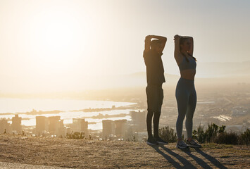 Fitness, silhouette and couple stretching in city in morning for motivation, inspiration and...