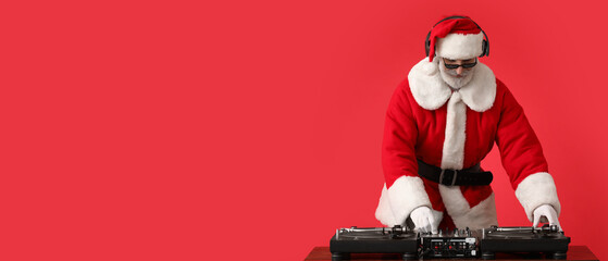 Cool Santa DJ playing music on red background with space for text