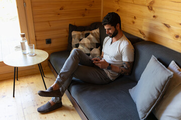 Man Texting On His Mobile Phone