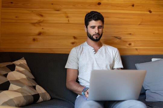 Entrepreneur Working On His Laptop At Home