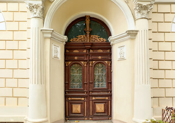 Fototapeta na wymiar Old building with beautiful ornate doors