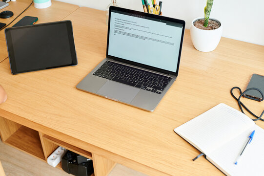Laptop and tablet on an office desk