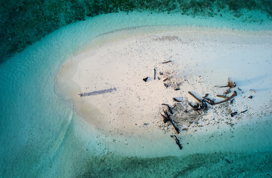 Man on island - Anthropocene, anthropogenic climate change, rising sea