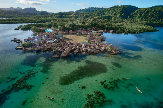 Traditional indigenous South Pacific Islander stilt village houses