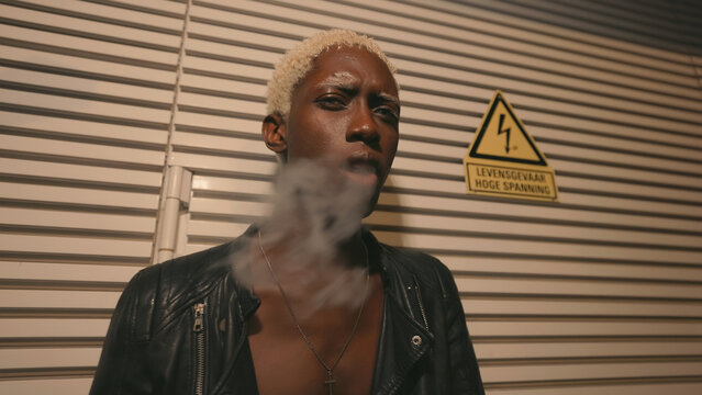 Young black guy smoking