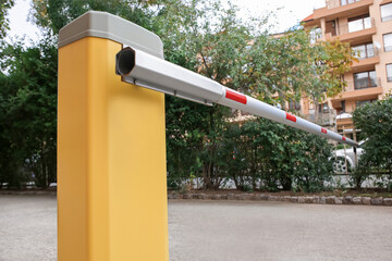 Closed automatic boom barrier on autumn day outdoors © New Africa
