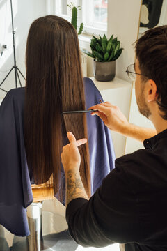 Close-up of Hairdresser Cutting Client's Hair
