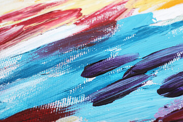 Obraz premium Beautiful strokes of colorful oil paints on white canvas as background, closeup