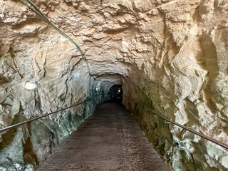 Pathway in long old tunnel