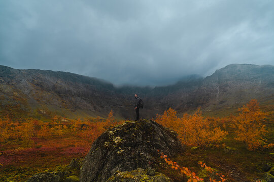Hiker in the autumn mountains