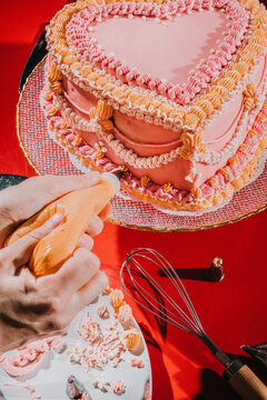 decorating butter cake with cream.