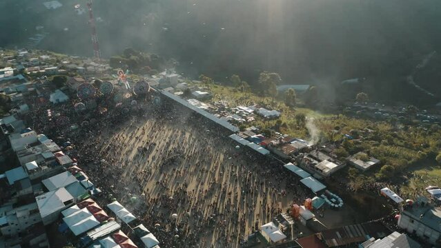 A Mass Gathering Of People During The Sumpango Kite Festival In The Sacatepequez Region of Guatemala. Aerial Drone Shot