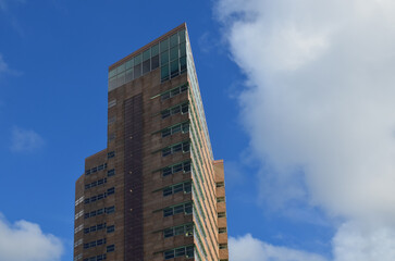 Fototapeta premium Exterior of beautiful building against blue sky, low angle view