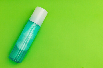 Washing foam, personal care products on a green background