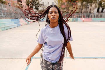 Confident black woman dancing