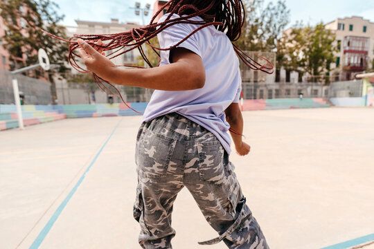 Urban black woman dancing