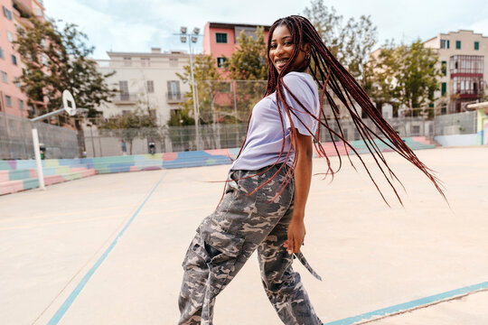 Urban black woman dancing
