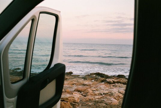 Car Door Open At Rocky Ocean Coast