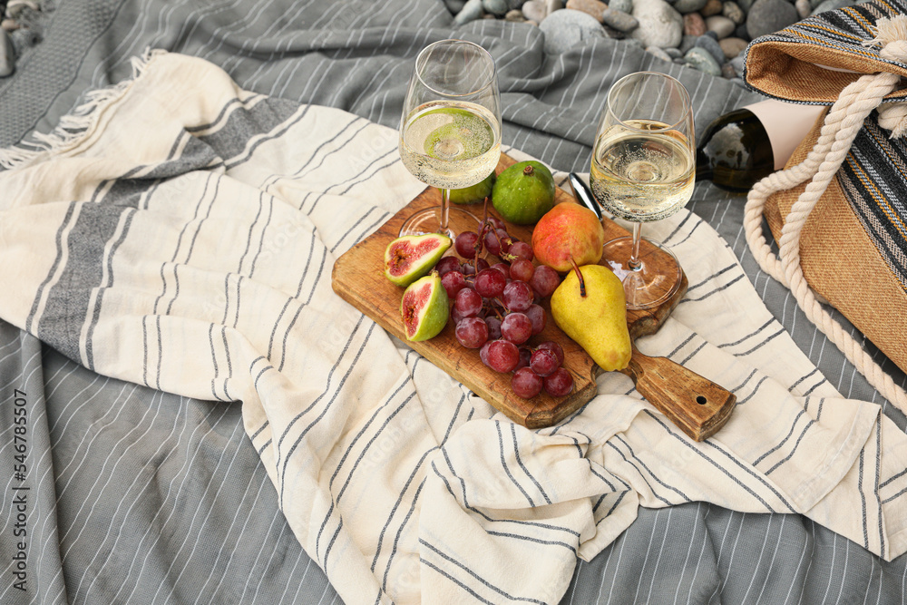 Canvas Prints White wine and fresh fruits on picnic blanket outdoors