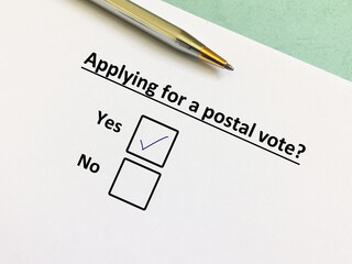 Fototapeta premium One person is answering question about election. He is applying for a postal vote.