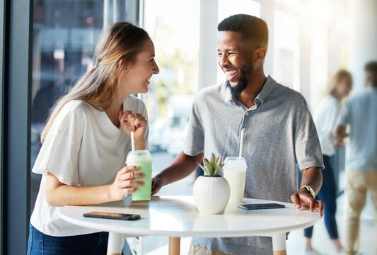 Happy, Smoothie And Smile With Couple On Cafe Date For Shopping, Health And Lunch Break. Restaurant, Diet And Nutrition With Man And Woman At Table Of Juice Bar For Natural, Detox And Energy