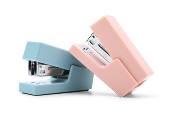 Colorful staplers isolated on white background