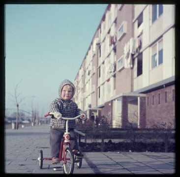 toddler on tricycle