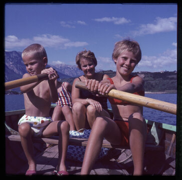 mother and three children in rowing boat