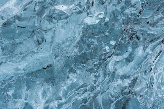 Ice texture from a block of glacier ice, J&ouml;kuls&aacute;rl&oacute;n beach, Iceland