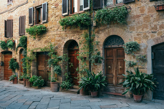 Fototapeta Pots and window boxes in Pienza