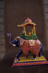 ceramic model of traditional elephant.."selectivefocus""shallowdepthoffield"followfocus"or"blur".