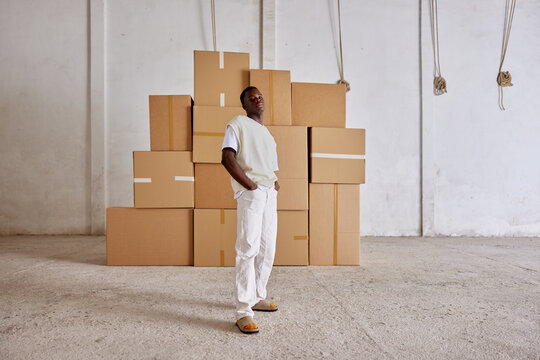 Storehouse worker on ladder