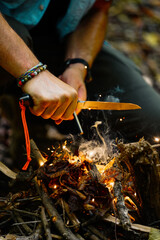 Bushcraft fire starting with fire steel and striker