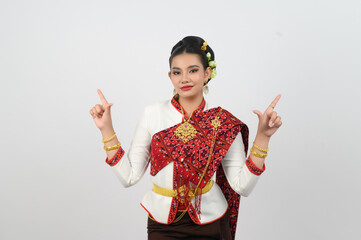 Young beautiful woman dres local culture in southern point finger posture