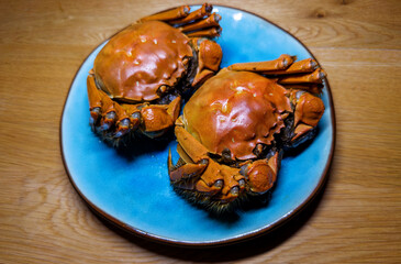 Cooked hairy crabs on the table.