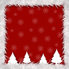 Red christmas background with snowflakes and christmas tree of the december christmas season.