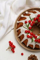 Tasty Christmas cake with cranberry on light background, closeup