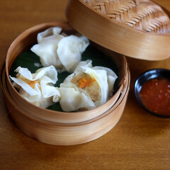 hot and delicious dimsum photo with a sweet Spicy and sour tomato sauce