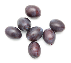 Ripe plum berries isolated on white background.