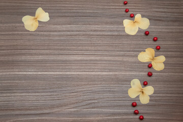 Butterfly pattern with red berries on wood