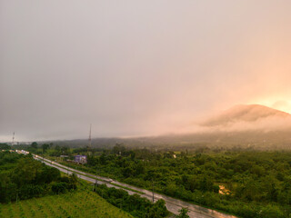 Mountain and road with Sunrise in localside