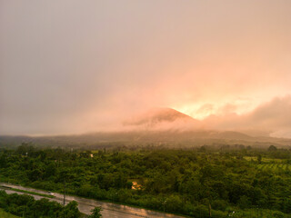 Mountain and road with Sunrise in localside