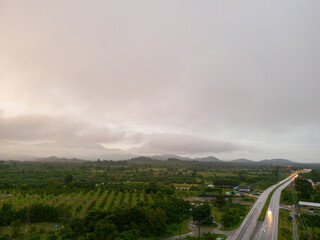 Mountain and road with Sunrise in localside