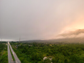 Mountain and road with Sunrise in localside