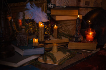 Fototapeta na wymiar Illustration of magical stuff....candle light, magic wand, book of spells dark background, wizarding school, mystical aesthetic