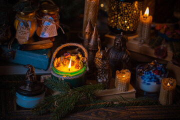 Illustration of magical stuff....candle light, magic wand, book of spells dark background, wizarding school, mystical aesthetic