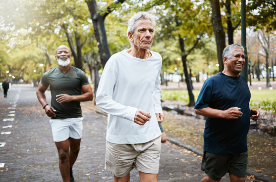 Run, group and senior men training, running and in street for health, wellness and fitness outdoor. Retirement, healthy males and friends running together, strong workout and exercise for cardio
