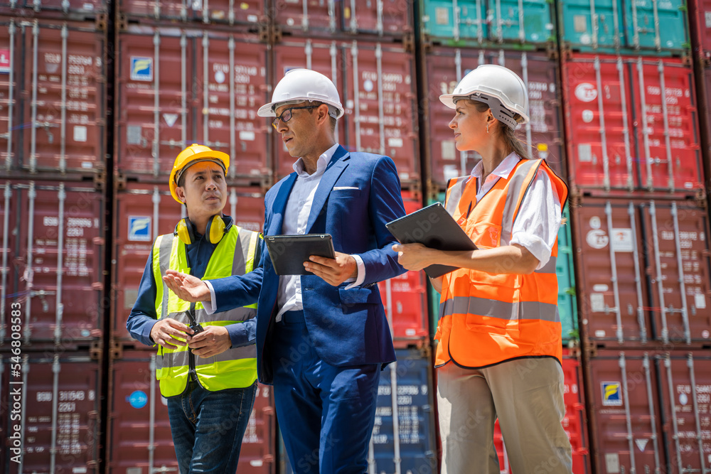 Poster Businessman and engineer or Foreman checking the container to prepare the delivery to the customer.