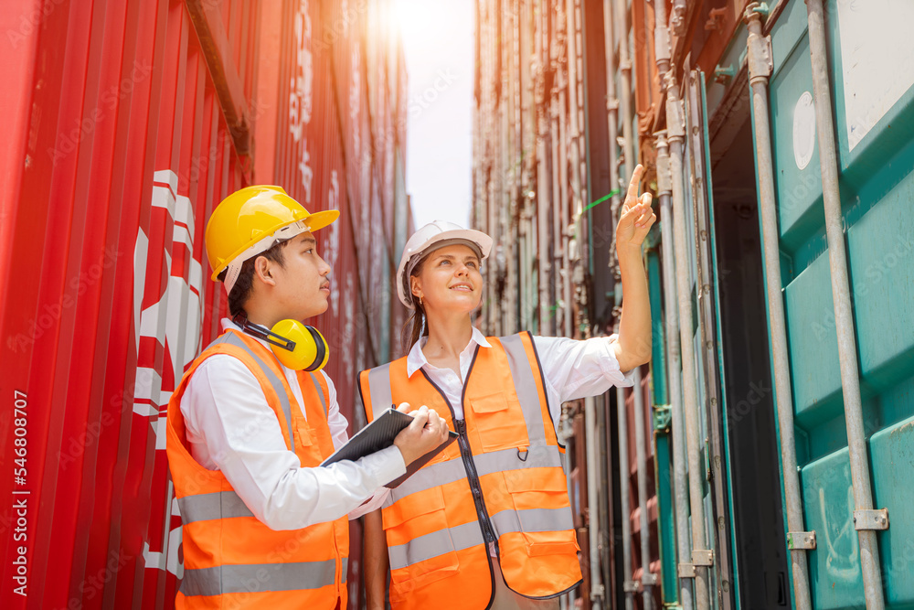 Poster Engineer working and checking a quality of containers box from cargo ship for export and import,Container Shipping Logistics Engineering concept.